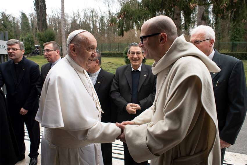 Pope Francis greets Benedictine Abbot Bernardo Gianni during the Lenten retreat for the Roman Curia in Ariccia, Italy, March 10, 2019.