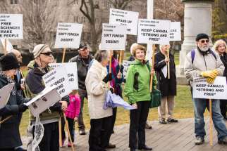 About 30 protesters gathered in front of Queen&#039;s Park Nov. 30 to protest agains the College of Physicians and Surgeons of Ontario&#039;s policy that would force doctors to provide abortion and assisted suicide referrals.