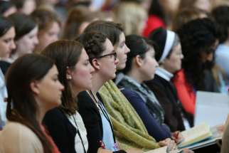 Women listen to a keynote speaker at a young Catholic women leadership forum in Arlington, Va. June 8. The Congregation for the Doctrine of the Faith held a symposium at the Vatican Sept. 26-28 discussing the role of women in the Catholic Church.