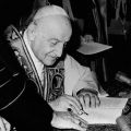 Pope John XXIII signs his encyclical &quot;Peace on Earth&quot; (&quot;Pacem in Terris&quot;) at the Vatican in this 1963 file photo. Considered a highlight in Catholic social teaching, the encyclical addresses universal rights and relations between states. The document mar ks its 50th anniversary April 11, the date of its issue.