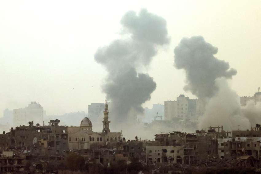 Smoke rises after an Israeli airstrike on Gaza seen from a viewpoint in Southern Israel Oct. 24, 2023.