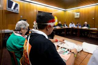 Members, observers and experts at the Synod of Bishops for the Amazon meet in a small working group Oct. 10, 2019, in the Vatican synod hall. The small group reports, released Oct. 18, pledged the church&#039;s support for the rights of indigenous people and a renewed commitment to safeguarding creation. Some groups also proposed the ordination of some married men to the priesthood and the development of official ministries for women in the church, possibly including the diaconate.