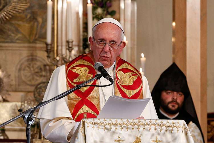 Pope Francis speaks as he visits the Armenian Apostolic Cathedral at Etchmiadzin in Vagharshapat, Armenia, June 24.