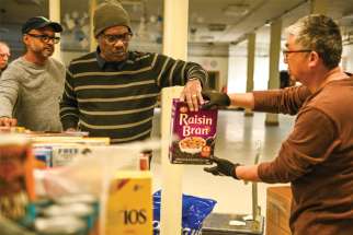 Volunteers at St. Ann’s Food Bank distribute close to $600,000 in food donations annually.
