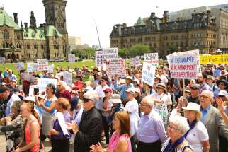 Opponents of euthanasia and assisted suicide rallied on Parliament Hill in June 2016 during the debate on the doctor-assisted dying bill, which became law. More changes are now being debated.