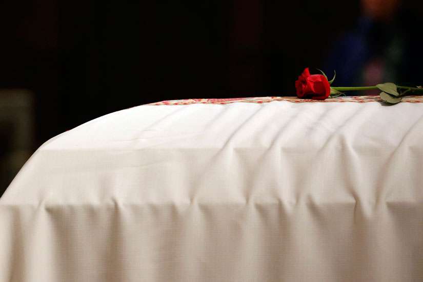 The casket of Jesuit Father Daniel Berrigan during his funeral Mass May 6. There has been a lack of consensus among Canadian bishops as to whether individuals who opts for assisted suicide.