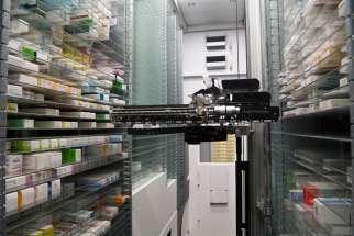 A pharmaceutical robot is seen at the Vatican in this undated photo. The Vatican pharmacy, which serves some 2,000 customers a day, has started using a pharmacy robot to more efficiently manage its stock, automatically retrieve medications and deliver them quickly to the sales floor.