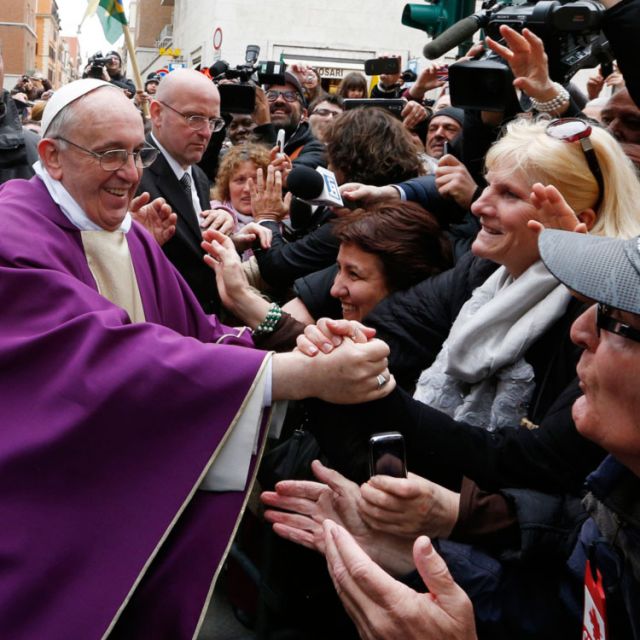 Domenico Giani, head of the Vatican police, in glasses behind Pope Francis, looks on as the newly elected pontiff greets people after celebrating Mass at St. Anne&#039;s Parish within the Vatican March 17. Pope Francis&#039; style of breaking away from his securit y detail and diving toward the crowds means his protectors have had to do a quick rewrite of strategy, sometimes on the spot.