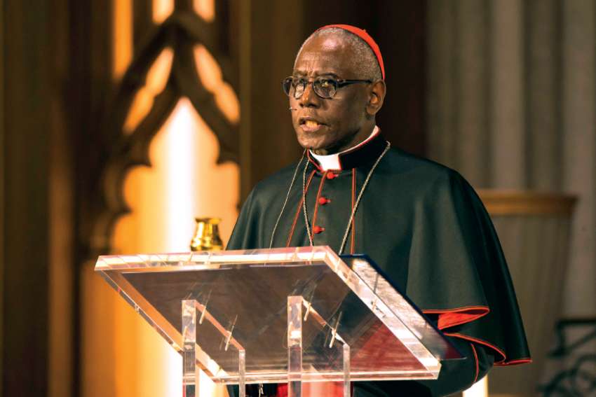 Cardinal Robert Sarah, seen here speaking at St. Michael’s Cathedral earlier this year, reminds us that God is silence and that the divine silence dwells in man. 