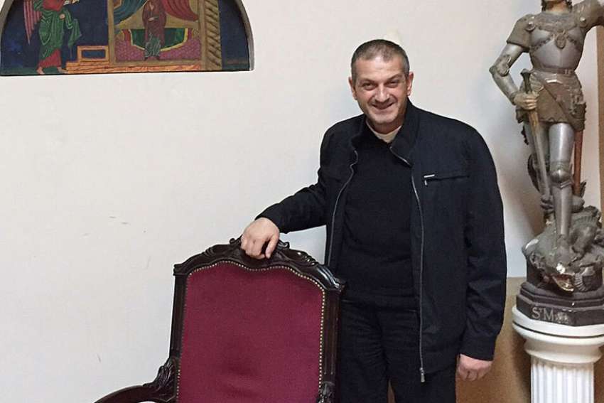 Father Jacques Mourad poses for a photo Nov. 11, 2015 at Our Lady of the Annunciation Church in Beirut. The Syriac-Catholic priest, who was held captive by the Islamic State group for nearly five months in 2015, called on Canada to undertake diplomatic steps to end the Syrian civil war.