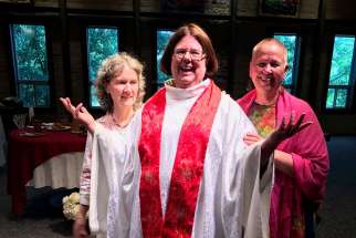 The Association of Roman Catholic Women Priests ordained Abigail Eltzroth, centre, as priest at Jubilee! Community church in Asheville, N.C. April 30.