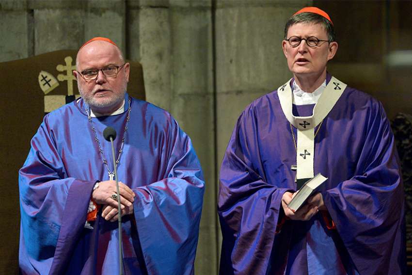 Cardinal Reinhard Marx of Munich-Freising, president of the German bishops&#039; conference, and Cardinal Rainer Woelki of Cologne concelebrate Mass March 6 during the opening of the annual meeting of Germany&#039;s bishops at the cathedral in Cologne