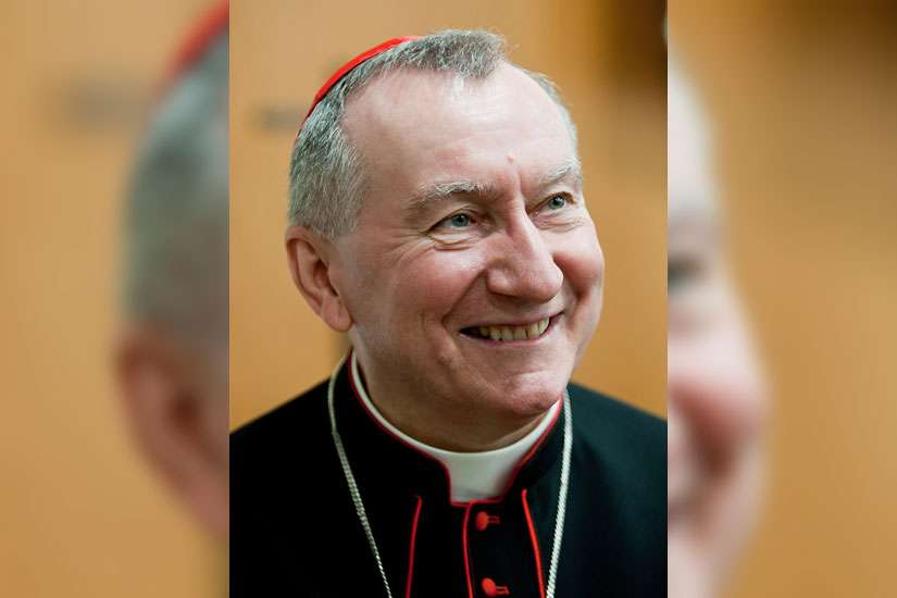 Cardinal Pietro Parolin, Vatican secretary of state, smiles as he attends a conference commemorating the 50th anniversary of the Second Vatican Council&#039;s document, &quot;Nostra Aetate.&quot; 