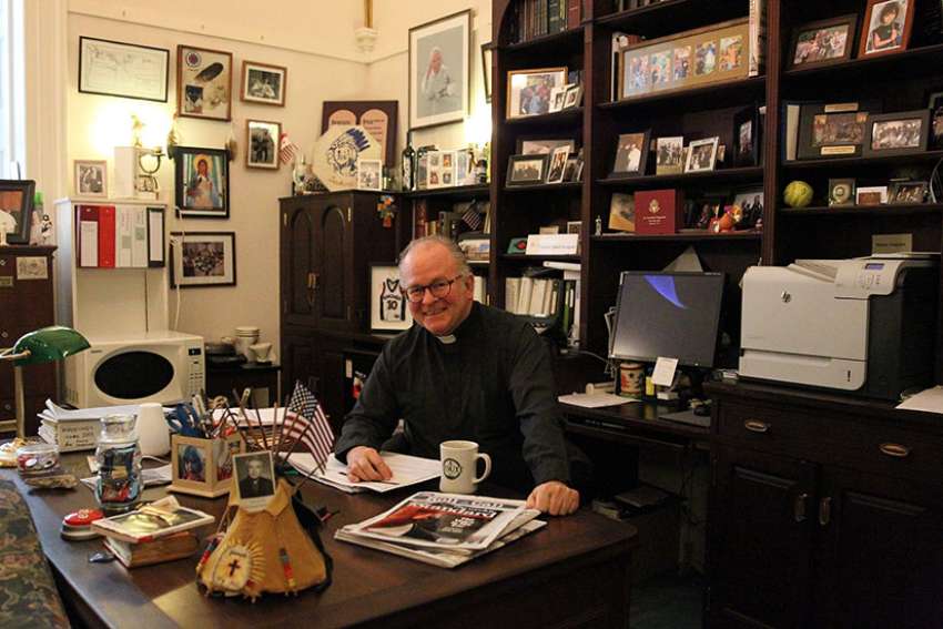 Jesuit Father Patrick J. Conroy, pictured in a May 8 photo, has been the chaplain of the U.S. House of Representatives since 2011. He said he always knew he wanted to work in Congress but never imagined he would do so as a priest.