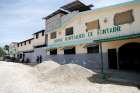 An exterior view of the Fontaine Hospital Center is pictured in the neighborhood of Cité Soleil, Port-au-Prince, Haiti, July 27, 2023. The hospital located in an extremely impoverished area of Haiti&#039;s capital -- had to be evacuated Nov. 15 after armed gang clashes enveloped the facility.