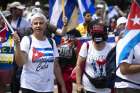 People gather near the White House in Washington July 25, 2021, at a protest calling for freedom in Cuba and urging U.S. President Joe Biden to do more to pressure the Cuban regime.