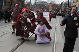 The re-enactment of Christ’s Passion will return to the streets of Toronto’s Little Italy following a three-year hiatus due to the pandemic. Above is a scene from the 2011 Good Friday procession.