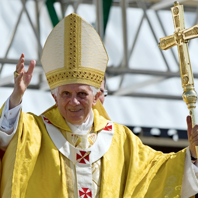 Pope Benedict XVI waves to the crowd during the closing Mass of World Youth Day at Cuatro Vientos airfield in Madrid Aug. 21.