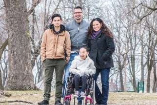 Athena Santos Roy hopes to finally walk after surgery in St. Louis next month. Athena is pictured with her brother Phoenix Santos Roy, stepfather James Duncanson and mother Fiona Santos. 