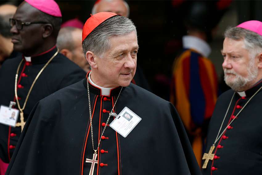 Cardinal Blase J. Cupich of Chicago leaves a session of the Synod of Bishops on young people, the faith and vocational discernment at the Vatican Oct. 11. 