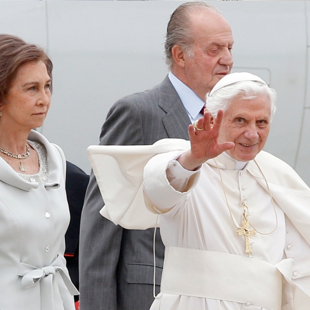 Pope Benedict XVI waves after being welcomed by Spain&#039;s King Juan Carlos and Queen Sofia at Madrid&#039;s Barajas airport Aug. 18.