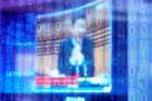 Chinese President Xi Jinping is shown on a screen through digitally decorated glass during the World Internet Conference in Wuzhen, China, in this Nov. 23, 2020, file photo. The Chinese Communist Party is seeking to expand its apparatus to monitor and curb religious activities in cyberspace through training and deploying hundreds of &quot;auditors&quot; across the country, triggering concerns from rights groups.