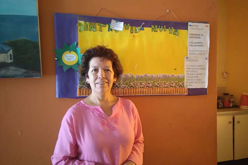 Maria Escalona Devia, who works at Centro Vida Nueva, a local church-run health centre in Santiago, Chile, poses for a photo March 10 at the centre.