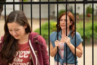 Ashley Bratcher, right, who plays Abby Johnson, is pictured in a scene from the film &quot;Unplanned,&quot; the story of Abby Johnson, a former Planned Parenthood clinic director, and her decision to join the pro-life movement.