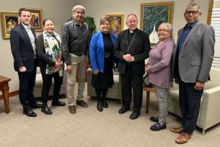 Kamloops First Nation and Archdiocese of Vancouver representatives during a meeting in February.  Vancouver Archbishop J. Michael Miller, third from right, will join a reconciliation service with the Tk’emlups te Secwépemc First Nation Easter Sunday.
