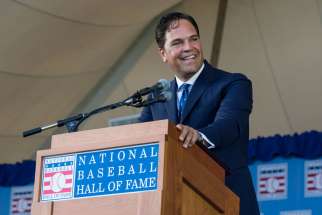 Mike Piazza makes his acceptance speech during the National Baseball Hall of Fame induction ceremony July 24 in Cooperstown, N.Y. The superstar catcher gave credit to his Catholic faith for his success in his life and career.