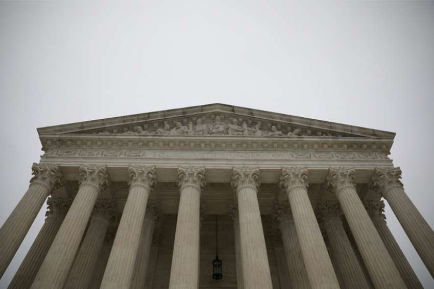 Rain falls on the U.S. Supreme Court in Washington Dec. 14, 2020.