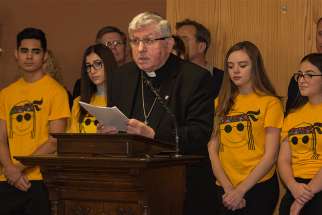 Flanked by camp counsellors for St. Benedict Parish&#039;s Summer Days Camp, Cardinal Thomas Collins pleads for the government to reconsider its requirement that Canada&#039;s Summer Jobs applications include an attestation supporting abortion rights. 
