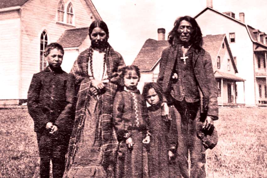 An Indigenous family is seen at the Oblate-run Ermineskin Indian Residential School in this undated photo. 