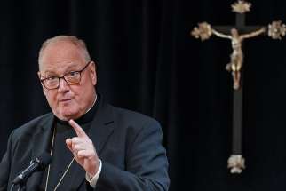 New York Cardinal Timothy M. Dolan holds a news conference Sept. 20 in New York City. Cardinal Dolan announced he has appointed a retired federal judge to independently review the way the Archdiocese of New York has been handling the sexual abuse cases involving Catholic priests and church workers. 