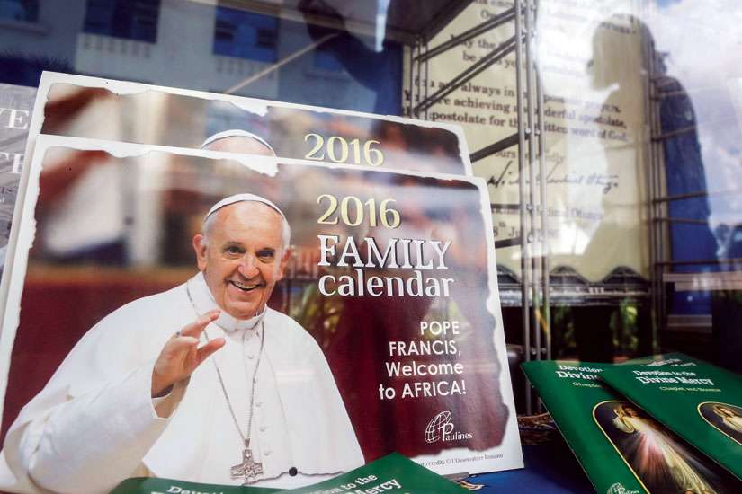 Pope Francis calendars are displayed for sale in a bookstore in Nairobi, Kenya. Fr. Stan Chu Ilo says the Pope specifically chose to visit Kenya, Uganda and Central African Republic for their strong faith traditions and their exponential growth in membership.