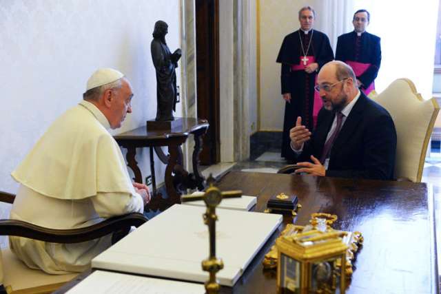 Pope Francis talks with Martin Schulz of Germany, president of the European Parliament, during a meeting at the Vatican in this photo dated Oct. 11, 2013.  Pope Francis will address the European Parliament in Strasbourg, France, Nov. 25.