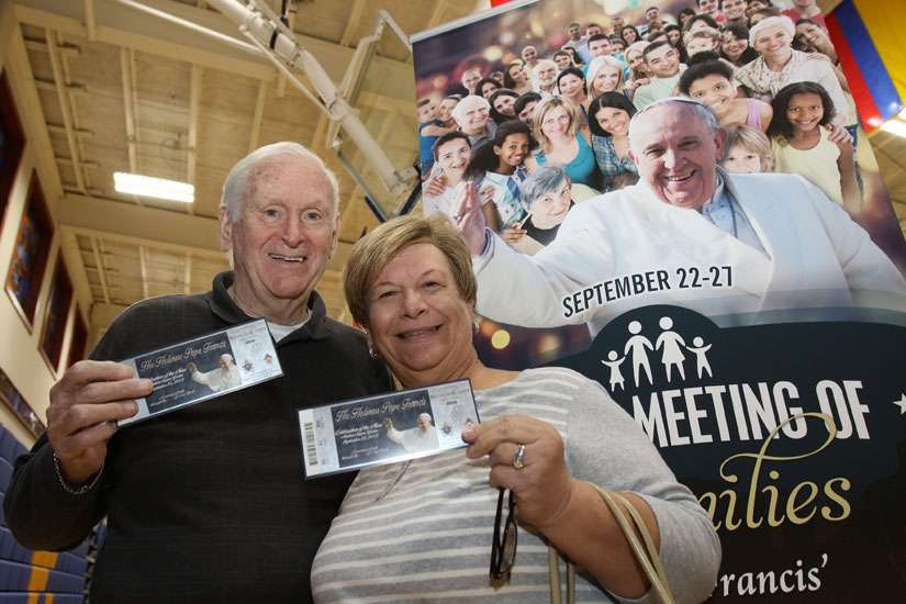 Harold and Carmela Lubeski of Cure of Ars Parish in Merrick, N.Y., display their tickets for Mass with Pope Francis at Madison Square Garden in New York City.  Tickets for Pope Francis’ procession through Central Park have started appearing for sale at huge markups on website like Craigslist and eBay. 