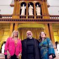 Rose Simonetti, Fr. Vito Marziliano and Christine Horgan pose together behind the altar at St. Clare’s Church, which will celebrate its 100th anniversary beginning in August.