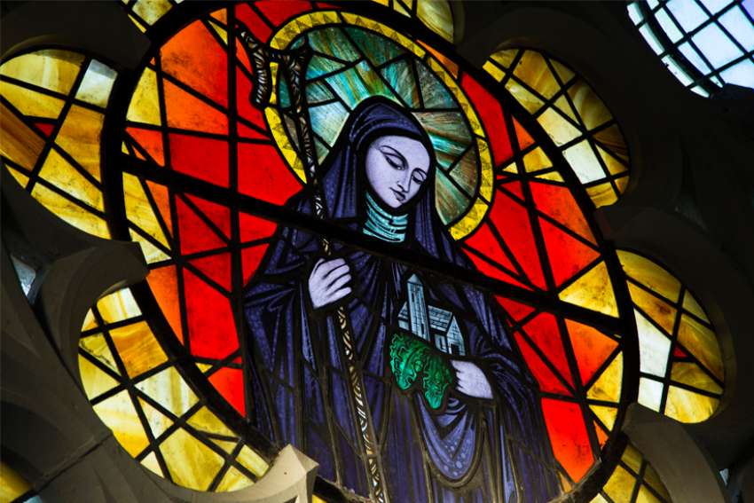 St. Brigid of Kildare is pictured in a stained-glass window in St. Brigid&#039;s Church in Crosshaven, a village in County Cork, Ireland, Jan. 20, 2022. The Irish government has added a new public holiday to the national calendar to honor the country&#039;s female patron, St. Brigid of Kildare.