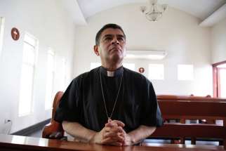 Bishop Rolando Álvarez of Matagalpa, Nicaragua, a frequent critic of Nicaraguan President Daniel Ortega, prays at a Catholic church in Managua May 20, 2022. A Nicaraguan court sentenced Álvarez to more than 26 years in prison Feb. 10 for conspiracy and spreading false information.