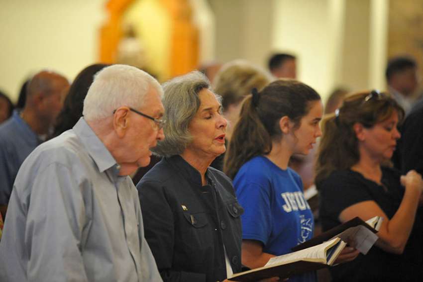 More than 150 people attend a prayer service at St. Catherine of Siena Church in Metairie, La., June 14 for the recovery of House Majority Whip Steve Scalise, R-La., and four others who were shot by a lone gunman while practicing in Alexandria, Va., for a charity baseball event. Scalise, his wife, Jennifer, and their two children are parishioners at the church. 