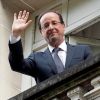 France&#039;s newly elected President Francois Hollande waves from a balcony at his campaign headquarters in Paris May 7, the day after his election. Hollande became the nation&#039;s first Socialist president in 17 years.