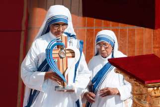 Missionaries of Charity nuns present a relic of St. Teresa of Kolkata as Pope Francis celebrates the canonization Mass of Mother Teresa in St. Peter&#039;s Square at the Vatican Sept. 4.