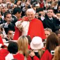 Pilgrims have their cameras ready as Pope Benedict XVI makes his way through the crowd in St. Peter’s Square at the Vatican before a general audience in 2007. The 85-year-old pontiff said he no longer has the energy to exercise his ministry over the universal Church and will resign at the end of the month.