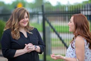 Abby Johnson, left, is seen on the set of the movie Unplanned with actress Ashley Bratcher, who plays her. The movie details the story of Johnson, a former Planned Parenthood administrator who quit that job to join the pro-life movement after her up-close interaction with abortion.
