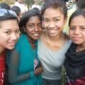 Isabel Ng-Lai, far left and Miranda Dela Cruz, second from right, pictured in India with some of the children who inspired them to start their charitable organization, 1Focus.