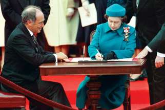 Queen Elizabeth II signs the Canadian Charter of Rights and Freedoms in 1982 as then prime minister Pierre Trudeau looks on. Pro-euthanasia forces have used Canada’s Charter to portray opposition to euthanasia as being opposed to human rights.