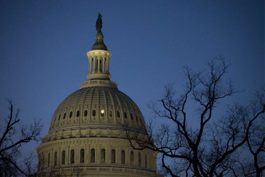 The U.S. Capitol is seen at dawn in Washington Jan. 10, 2021.