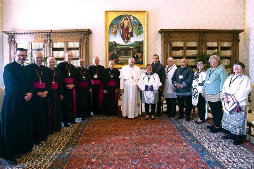 Pope Francis is pictured with Canadian Indigenous delegates from the Métis National Council and bishops representing the Canadian bishops’ conference during a meeting at the Vatican March 28.