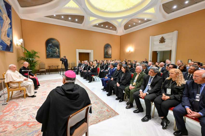 Pope Francis meets with participants from a seminar on ethics in health care management at the Vatican Nov. 30, 2023.